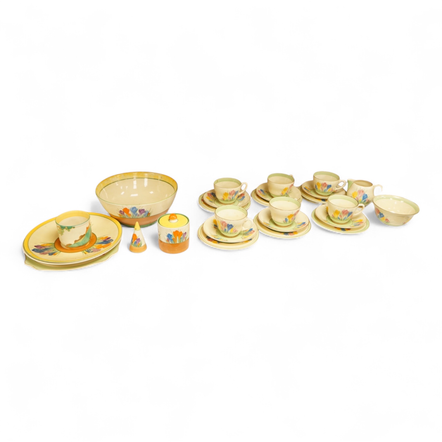Collection of Clarice Cliff crocus pattern tea wares to include trios, milk jug, and a bowl, largest 22cm in diameter